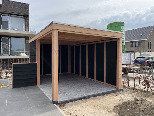 Design Tuinkamer in Zutphen: Platdak Overkapping met Glazen Schuifdeuren
